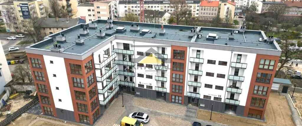 dazu-miejsca-postojowe-w-nowym-budynku-bfa131